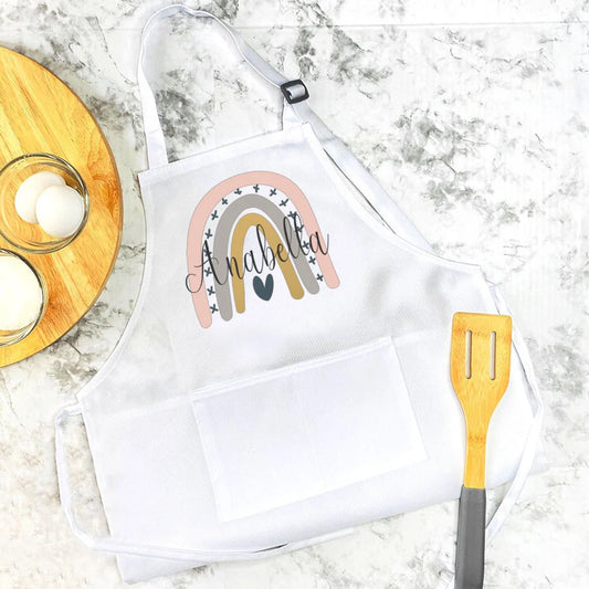 Personalisierte Kinderschürze mit Regenbogen-Motiven 1