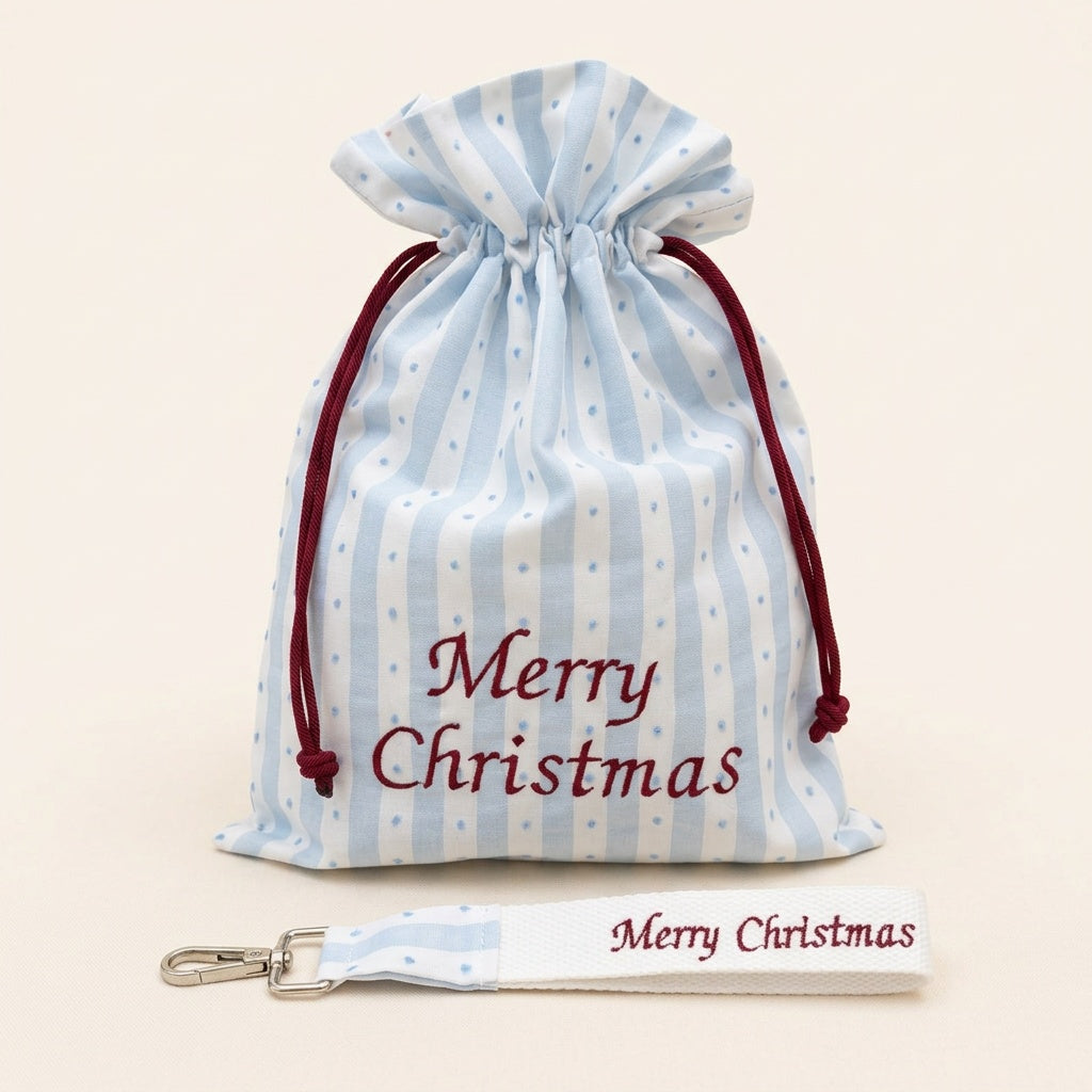 Geschenkbeutel für Weihnachten mit Stickerei Merry Christmas mit Schlüsselanhänger